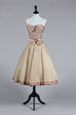 Lot 87 - A Chanel couture striped satin cocktail dress,...