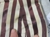 Lot 87 - A Chanel couture striped satin cocktail dress,...