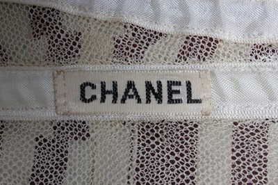 Lot 87 - A Chanel couture striped satin cocktail dress,...