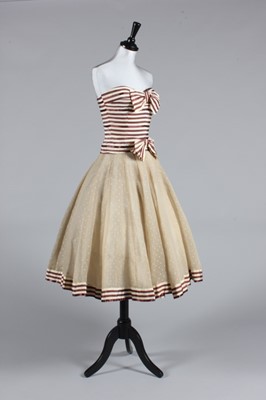 Lot 87 - A Chanel couture striped satin cocktail dress,...
