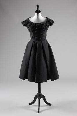 Lot 88 - A Christian Dior couture heavy black silk...
