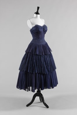 Lot 83 - A Pierre Balmain couture blue lace cocktail...