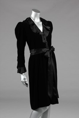 Lot 197 - An Yves Saint Laurent black velvet cocktail...