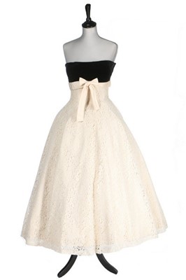 Lot 144 - A Balenciaga couture velvet and lace evening...