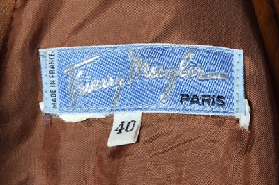 Lot 229 - A Thierry Mugler soft brown leather dress,...