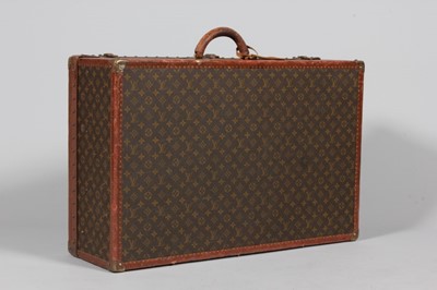 Lot 238 - A Louis Vuitton hard-sided suitcase, probably...