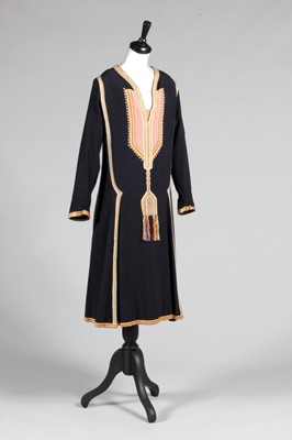Lot 69 - A rare Paul Poiret navy wool day dress...