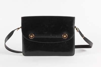 Lot 6 - An Hermès black leather handbag, late 1960s,...