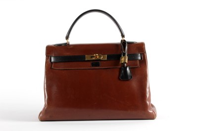 Lot 15 - An Hermès brown box leather Kelly bag with...