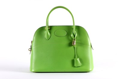 Lot 14 - An Hermès apple-green leather Bolide bag, 1995,...