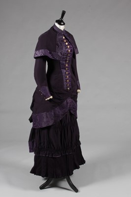 Lot 62 - A dark purple wool and moir silk mourning...