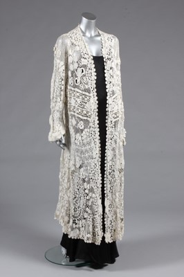 Lot 65 - An Irish crochet coat, circa 1910, elaborately...
