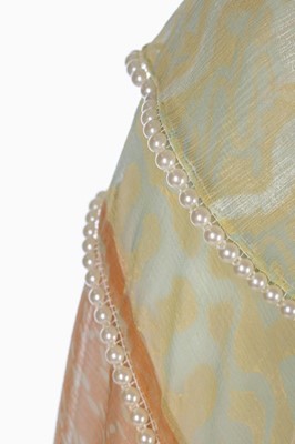Lot 127 - A Zandra Rhodes pale green printed chiffon...