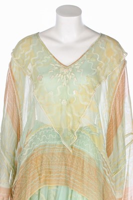 Lot 127 - A Zandra Rhodes pale green printed chiffon...