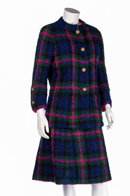 Lot 141 - A Chanel couture tartan tweed suit, 1971,...