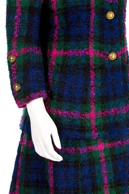 Lot 141 - A Chanel couture tartan tweed suit, 1971,...