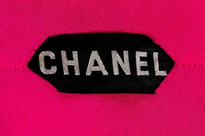 Lot 141 - A Chanel couture tartan tweed suit, 1971,...