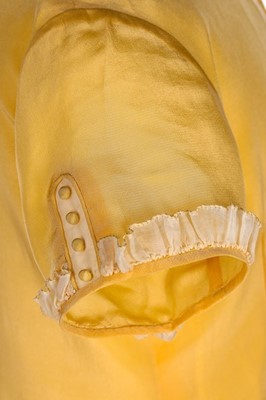 Lot 14 - Princess Margaret's primrose silk dress, Smith...