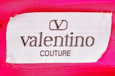 Lot 179 - A Valentino couture fuchsia silk cocktail...