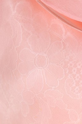 Lot 177 - A Christian Lacroix couture pale-pink organza...