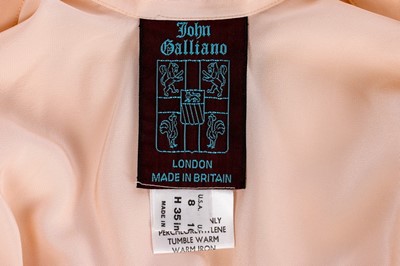Lot 158 - A John Galliano pale pink silk 'Circle' shirt,...