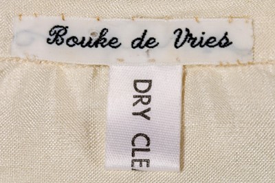 Lot 158 - A John Galliano pale pink silk 'Circle' shirt,...