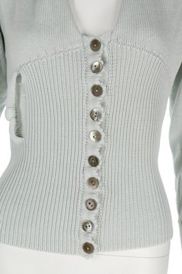 Lot 167 - A John Galliano eau de nil cotton sweater,...