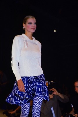 Lot 167 - A John Galliano eau de nil cotton sweater,...