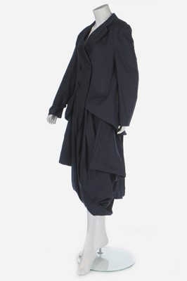 Lot 163 - A John Galliano navy gabardine 'Pannier' coat,...