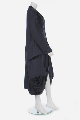 Lot 163 - A John Galliano navy gabardine 'Pannier' coat,...