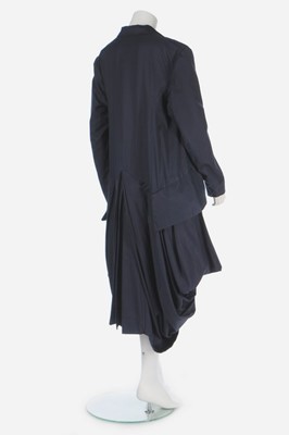 Lot 163 - A John Galliano navy gabardine 'Pannier' coat,...
