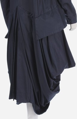 Lot 163 - A John Galliano navy gabardine 'Pannier' coat,...
