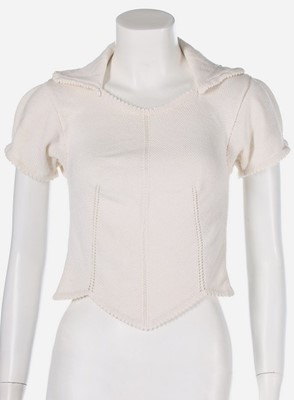 Lot 165 - A group of three knitted John Galliano tops,...
