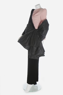 Lot 180 - A Valentino couture black velvet and pink...