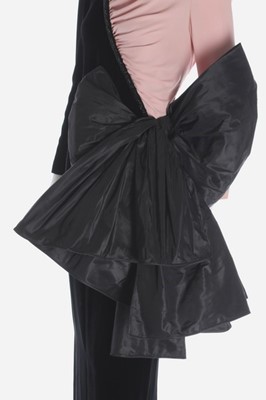 Lot 180 - A Valentino couture black velvet and pink...