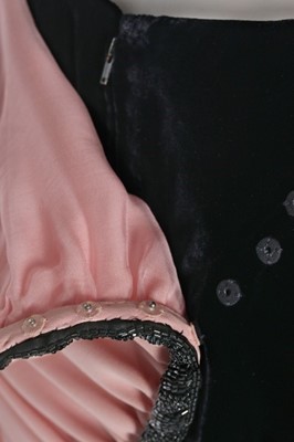 Lot 180 - A Valentino couture black velvet and pink...