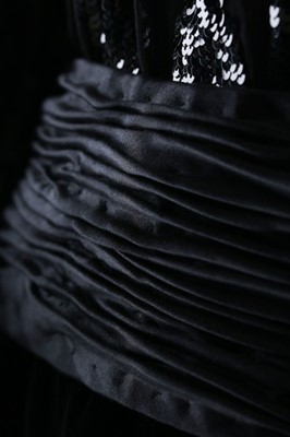 Lot 181 - A Valentino couture black velvet and sequinned...