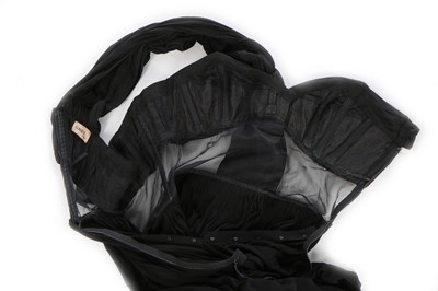 Lot 182 - A Madame Grès couture draped black silk jersey...