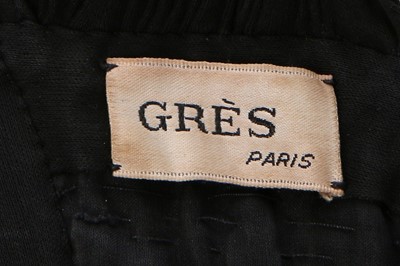 Lot 182 - A Madame Grès couture draped black silk jersey...