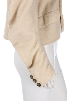 Lot 157 - A rare John Galliano ivory 'blanket' jacket,...