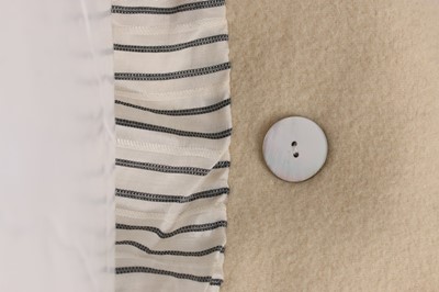 Lot 157 - A rare John Galliano ivory 'blanket' jacket,...