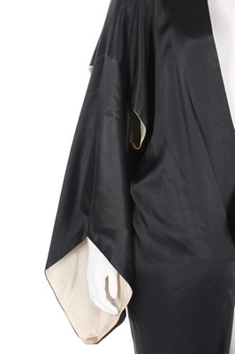 Lot 171 - A John Galliano black satin kimono evening...