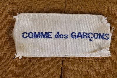 Lot 191 - A rare and early Comme des Garçons 'Obi' coat,...