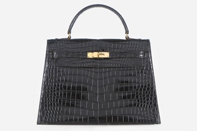 Lot 12 - An Hermès black crocodile Kelly bag, circa...