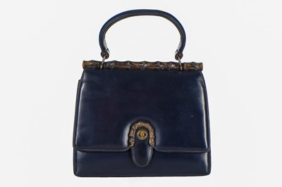Lot 4 - A Gucci navy leather handbag, late 1950s-early...