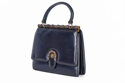 Lot 4 - A Gucci navy leather handbag, late 1950s-early...