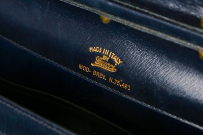 Lot 4 - A Gucci navy leather handbag, late 1950s-early...