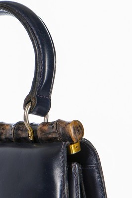 Lot 4 - A Gucci navy leather handbag, late 1950s-early...