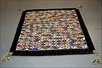Lot 75 - A patchwork coverlet, circa 1860, composed of...