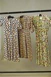 Lot 228 - A group of 1940s clothing, mainly daywear,...